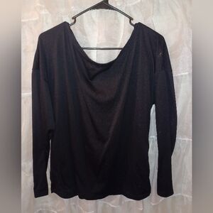 Long sleeve black top, open criss-cross back